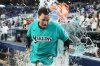 Miami Marlins' Heriberto Hernández is doused after hitting a walk-off grand slam during the ninth inning to defeat the New York Mets in a baseball game, Sunday, May 24, 2026, in Miami. (AP Photo/Lynne Sladky)