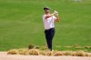 Wyndham Clark watches his shot out of a hazard on the 10th fairway during the final round of the CJ Cup Byron Nelson golf tournament in McKinney, Texas, Sunday, May 24, 2026. (AP Photo/Tony Gutierrez)