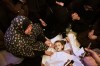 Relatives mourn around the body of 6-year-old Palestinian girl Menna Allah Abu Labda, who was killed in an Israeli airstrike, during her funeral at Nasser Hospital in Khan Younis, Gaza Strip, Monday, May 25, 2026. (AP Photo/Abdel Kareem Hana)