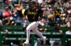 Pittsburgh Pirates' Spencer Horwitz scores a run on a RBI-double by Pittsburgh Pirates' Brandon Lowe during the third inning of a baseball game against the Chicago Cubs, Monday, May 25, 2026, in Pittsburgh. (AP Photo/David Dermer)