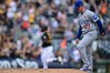 Chicago Cubs relief pitcher Trent Thornton (49) waits for Pittsburgh Pirates' Henry Davis, back left, to run the bases after hitting a solo home run during the eighth inning of a baseball game, Monday, May 25, 2026, in Pittsburgh. (AP Photo/David Dermer)