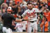Baltimore Orioles' Colton Cowser, right, celebrates with teammates after hitting a walk off two-run home run during the 13th inning of a baseball game against the Tampa Bay Rays, Monday, May 25, 2026, in Baltimore. (AP Photo/Stephanie Scarbrough)