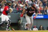 Washington Nationals' Luis Garcia Jr., right, watches his two-run single off Cleveland Guardians relief pitcher Logan Allen as catcher Patrick Bailey look on during the sixth inning of a baseball game, Monday, May 25, 2026, in Cleveland. (AP Photo/Phil Long)