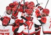 Carolina Hurricanes' Andrei Svechnikov (37) celebrates his game-winning overtime goal with teammates in Game 3 of the NHL Eastern Conference final playoff series against the Montreal Canadiens, in Montreal on Monday, May 25, 2026. THE CANADIAN PRESS/Graham Hughes