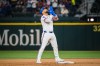 Texas Rangers' Ezequiel Duran reacts after hitting a double during the first inning of a baseball game against the Houston Astros, Tuesday, May 26, 2026, Arlington, Texas. (AP Photo/Jessica Tobias)