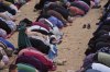 Muslims worshipers offer Eid al-Adha prayers in Gaza City Wednesday, May 27, 2026. (AP Photo/Jehad Alshrafi)