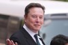 FILE - Elon Musk departs after a welcome ceremony with President Donald Trump and China's President Xi Jinping at the Great Hall of the People, Thursday, May 14, 2026, in Beijing. (AP Photo/Mark Schiefelbein, File)