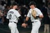 Chicago White Sox second baseman Chase Meidroth, left, celebrates with left fielder Sam Antonacci after the White Sox defeated the Minnesota Twins in a baseball game in Chicago, Wednesday, May 27, 2026. (AP Photo/Nam Y. Huh)