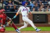 New York Mets' Carson Benge (3) hits an RBI single during the seventh inning of a baseball game against the Cincinnati Reds, Wednesday, May 27, 2026, in New York. (AP Photo/Yuki Iwamura)