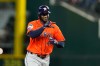 Houston Astros' Yordan Alvarez celebrates his solo home run in the fourth inning of a baseball game against the Texas Rangers Wednesday, May 27, 2026, in Arlington, Texas. (AP Photo/Tony Gutierrez)