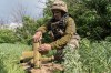 A Ukrainian soldier prepares an interceptor drone during a Russia's aerial attack at an undisclosed location near Kharkiv, Ukraine, Monday, May 25, 2026. (AP Photo/Andrii Marienko)