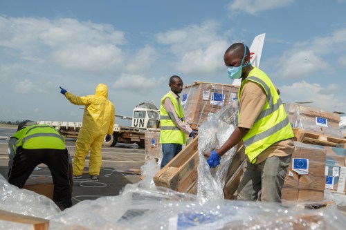 Workers offload medical and emergency supplies donated by the European Union to support frontline workers fighting Ebola at the national airport in Bunia, Democratic Republic of the Congo, on Thursday, May 28, 2026. (AP Photo/Moses Sawasawa)