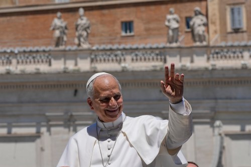 Pope Leo XIV waves as he leaves after his weekly general audience in St. Peter's Square at The Vatican, Wednesday, May 27, 2026. (AP Photo/Alessandra Tarantino)