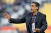 FILE - Former Vancouver FC head coach Afshin Ghotbi reacts during an AFC Asian Cup soccer match between Iran and North Korea in Doha, Qatar, on Jan. 15, 2011. Ghotbi and SixFive Sports & Entertainment, the ownership group behind Vancouver FC, said Wednesday they have settled a lawsuit tied to a disputed $500,000 loan. (AP Photo/Hassan Ammar, File)