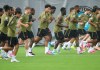 Tajon Buchanan, centre, runs in the rain with his teammates during Team Canada World Cup roster selection camp in Charlotte, N.C., on Tuesday, May 26, 2026. THE CANADIAN PRESS/Nathan Denette