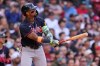Atlanta Braves' Ronald Acuña Jr. watches the ball on his grand slam during the sixth inning of a baseball game against the Boston Red Sox, Thursday, May 28, 2026, in Boston. (AP Photo/Charles Krupa)