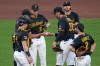 Pittsburgh Pirates pitcher Paul Skenes (30) hands the ball to manager Don Kelly as he leaves the game during the sixth inning of a baseball game against the Chicago Cubs in Pittsburgh, Thursday, May 28, 2026. (AP Photo/Gene J. Puskar)