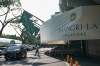 A man walk near the entrance of the Shangri-La Hotel, the venue for the International Institute for Strategic Studies (IISS) Shangri-La Dialogue, Asia's annual defense and security forum, in Singapore, Thursday, May 28, 2026. (AP Photo/Achmad Ibrahim)