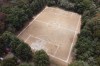 A soccer field nestled inside the crater of the extinct Teoca volcano hosts a local tournament match in the town of Santa Cecilia Tepetlapa in the Xochimilco borough of Mexico City, Sunday, April 19, 2026. (AP Photo/Eduardo Verdugo)