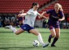 Ottawa Rapid's Delaney Baie Pridham, left, kicks the ball as Calgary Wild's Mijke Roelfsema closes in during second half Northern Super League soccer action in the in Calgary, on Sunday, May 11, 2025.THE CANADIAN PRESS/Jeff McIntosh