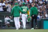 Athletics pitcher Luis Severino (40) walks off the mound with the trainer and manger Mark Kotsay, left, before the second inning of a baseball game against the New York Yankees Friday, May 29, 2026, in West Sacramento, Calif. (AP Photo/Scott Marshall)