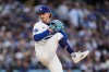 Los Angeles Dodgers pitcher Justin Wrobleski throws to the plate during the first inning of a baseball game against the Philadelphia Phillies, Friday, May 29, 2026, in Los Angeles. (AP Photo/Mark J. Terrill)