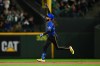 Seattle Mariners' J.P. Crawford gestures as he rounds the bases after hitting a one-run home run against the Arizona Diamondbacks during the first inning of a baseball game Friday, May 29, 2026, in Seattle. (AP Photo/Caean Couto)