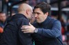 Manchester City's head coach Pep Guardiola, left, greets Bournemouth's head coach Andoni Iraola before the English Premier League soccer match between AFC Bournemouth and Manchester City in Bournemouth, England, Tuesday, May 19, 2026. (AP Photo/Ian Walton)
