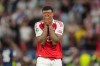 Arsenal's Gabriel Magalhaes reacts after missing to score during the penalty shoot out at the Champions League final soccer match between Paris Saint-Germain and Arsenal in Budapest, Hungary, Saturday, May 30, 2026. (AP Photo/Andreea Alexandru)