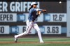 Washington Nationals shortstop CJ Abrams throws to first for an out during the first inning of a baseball game against the San Diego Padres, Saturday, May 30, 2026, in Washington. (AP Photo/Daniel Kucin Jr.)