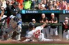 Baltimore Orioles' Jeremiah Jackson (82) avoids the tag by Toronto Blue Jays catcher Tyler Heineman and scores on a single by Gunnar Henderson during the third inning of a baseball game, Saturday, May 30, 2026, in Washington. (AP Photo/Terrance Williams)