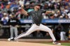 New York Mets pitcher Christian Scott throws during the first inning of a baseball game against the Miami Marlins, Saturday, May 30, 2026, in New York. (AP Photo/Adam Hunger)