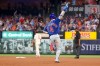 Chicago Cubs' Pete Crow-Armstrong points skyward as he runs the bases after hitting a solo home run during the eighth inning of a baseball game against the St. Louis Cardinals Saturday, May 30, 2026, in St. Louis. (AP Photo/Scott Kane)