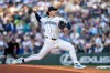 Seattle Mariners starter Bryan Woo delivers a pitch during the second inning of a baseball game against the Arizona Diamondbacks, Saturday, May 30, 2026, in Seattle. (AP Photo/Stephen Brashear)