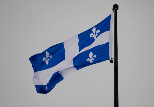 The Quebec Fleur-de-lis provincial flag flies on top of the National Assembly’s main tower, Wednesday, Jan. 18, 2023 in Quebec City. THE CANADIAN PRESS/Jacques Boissinot