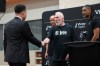 FILE - With the help of former players Manu Ginobili, back left, and Tim Duncan, right, former San Antonio Spurs head coach Gregg Popovich, center, introduces Mitch Johnson, left, as the new head coach of the San Antonio Spurs NBA basketball team, in San Antonio, May 5, 2025. (AP Photo/Eric Gay, File)