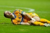 Tigres' Marcelo Flores grabs his knee after being injured during the CONCACAF Champions Cup final soccer match against Toluca in Toluca, Mexico, Saturday, May 30, 2026. (AP Photo/Fernando Llano)