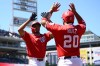 Washington Nationals' James Wood, left, celebrates after his two-run home run with Keibert Ruiz (20) during the fifth inning of a baseball game against the San Diego Padres, Sunday, May 31, 2026, in Washington. (AP Photo/Nick Wass)