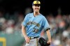 Milwaukee Brewers starting pitcher Jacob Misiorowski smiles after having a called strike overturned by a Houston Astros' ABS challenge during the first inning of a baseball game, Sunday, May 31, 2026, in Houston. (AP Photo/Eric Christian Smith)