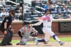 New York Mets' Juan Soto (22) watches his grand slam during the sixth inning of a baseball game against the Miami Marlins, Sunday, May 31, 2026, in New York. (AP Photo/Heather Khalifa)