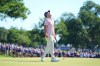 Russell Henley reacts after sinking a putt on the 18th hole during the final round of the Charles Schwab Challenge golf tournament at Colonial Country Club in Fort Worth, Texas, Sunday, May 31, 2026. (AP Photo/LM Otero)