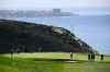 FILE - Justin Rose, of England, putts on the third green of the South Course at Torrey Pines during the final round of the Farmers Insurance Open golf tournament, Feb. 1, 2026, in San Diego. (AP Photo/Denis Poroy, file)