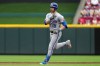 Kansas City Royals' Lane Thomas rounds the bases after hitting a grand slam during the first inning of a baseball game against the Cincinnati Reds, Monday, June 1, 2026, in Cincinnati. (AP Photo/Kareem Elgazzar)