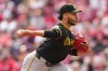 FILE - Pittsburgh Pirates pitcher Justin Lawrence throws during a baseball game against the Cincinnati Reds, April 13, 2025, in Cincinnati. (AP Photo/Jeff Dean, File)