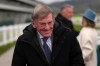 FILE - Former footballer Kenny Dalglish arrives for the final day of the British Horse Racing Cheltenham Festival at Cheltenham Racecourse, England, Friday, March 14, 2025. (AP Photo/Dave Shopland, file)