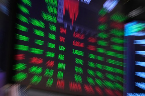 A board above the trading floor of the New York Stock Exchange is shown in this image, Tuesday, July 1, 2025. (AP Photo/Richard Drew)