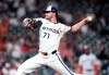 FILE - Houston Astros relief pitcher Josh Hader pitches to Washington Nationals' Riley Adams during the ninth inning of a baseball game, July 28, 2025, in Houston. (AP Photo/Karen Warren, File)