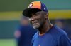 FILE - Houston Astros third base coach Gary Pettis smiles before a baseball game against the Texas Rangers on April 12, 2024, in Houston. (AP Photo/Kevin M. Cox, File)