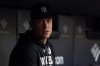 New York Yankees right fielder Aaron Judge (99) looks on from the dugout during the seventh inning of a baseball game against the Cleveland Guardians, Tuesday, June 2, 2026, in New York. (AP Photo/Adam Hunger)