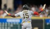 Pittsburgh Pirates' Oneil Cruz (15) celebrates his three-run home run against Houston Astros starting pitcher Mike Burrows during the sixth inning of a baseball game, Tuesday, June 2, 2026, in Houston. (AP Photo/Karen Warren)